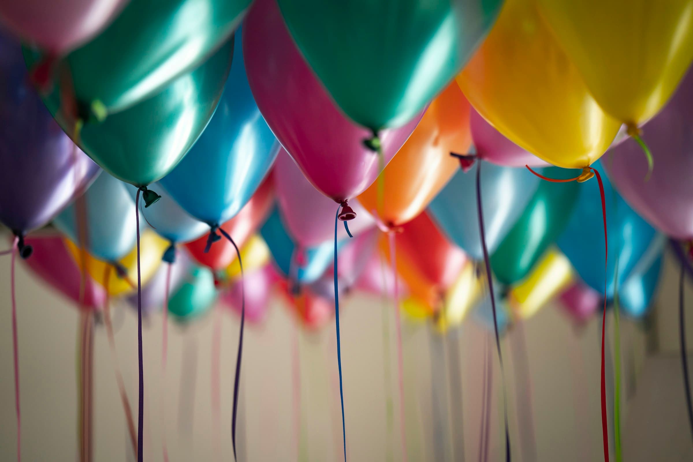 Decorations strung overhead in an event space before guests arrive